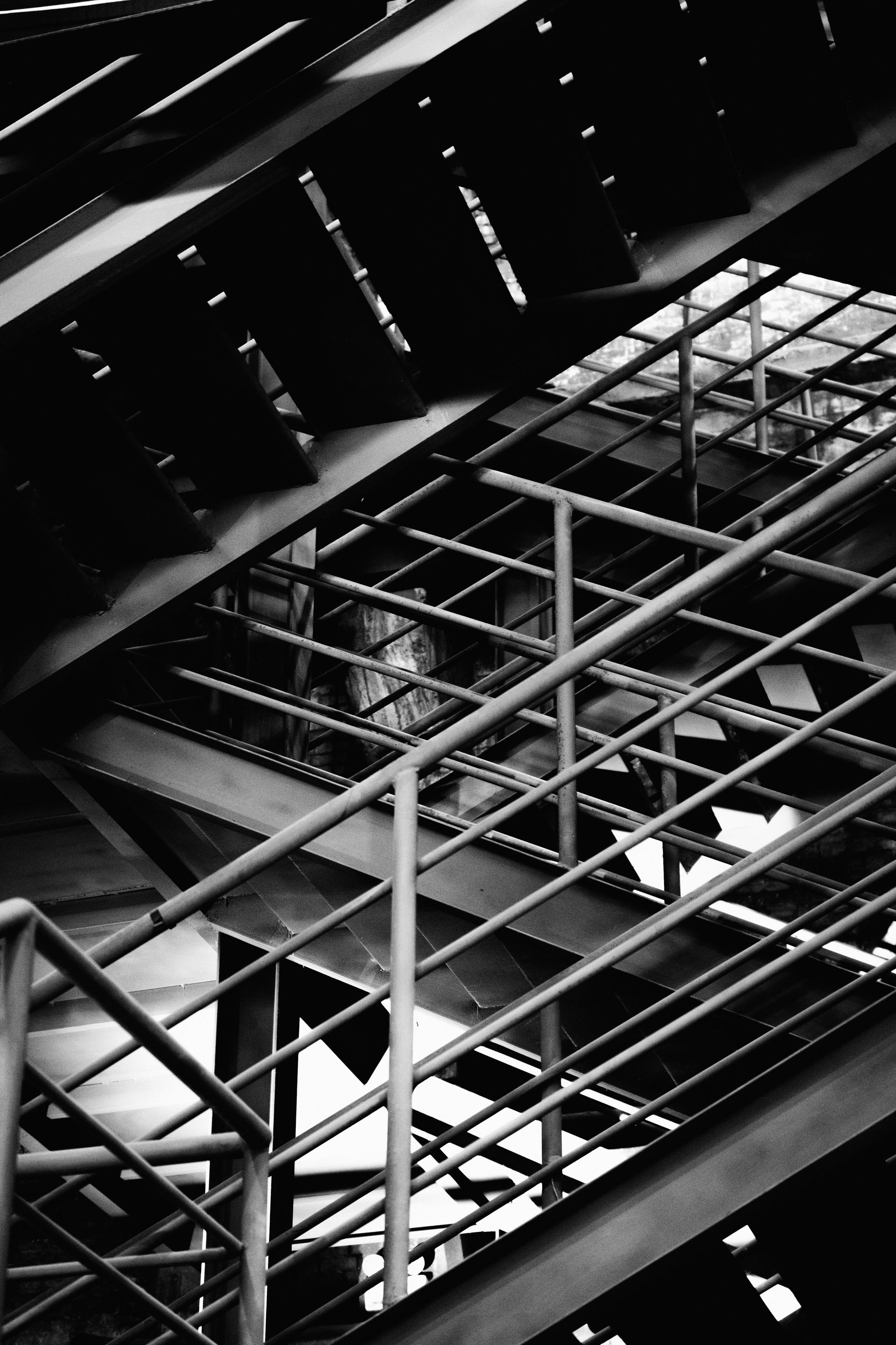 Abstract view of a metal staircase with railings